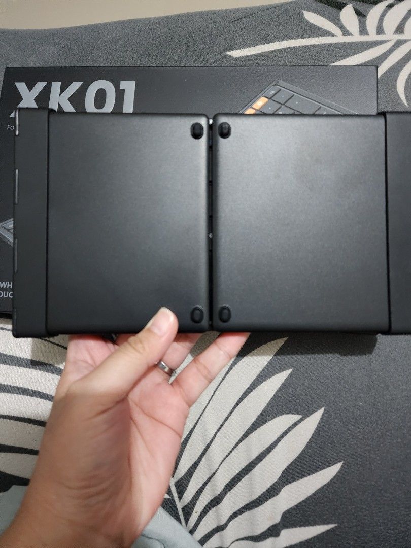 ProtoArc XK01 Foldable Full-Size Bluetooth Keyboard | 105 Keys (Category: Computer Keyboard) located in Makati City. Submitted by happycirclesph (Listing ID 1463929396, Image 3). Description: Selling my ProtoArc XK01 Foldable Full-Size Bluetooth Keyboard. ✨ Features: Full-size 105-key layout Built-in numeric keypad Tri-fold / foldable design Bluetooth connection — supports up to 3 devices Quiet scissor-switch keys USB-C rechargeable Lightweight a