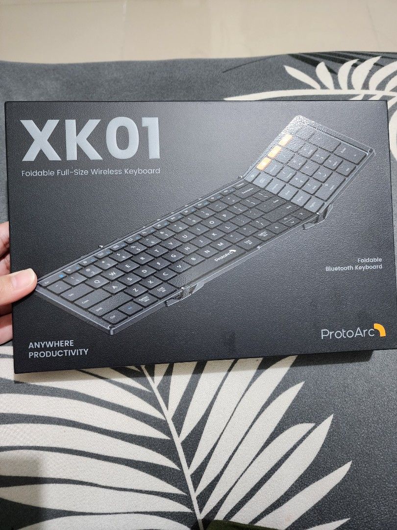 ProtoArc XK01 Foldable Full-Size Bluetooth Keyboard | 105 Keys (Category: Computer Keyboard) located in Makati City. Submitted by happycirclesph (Listing ID 1463929396, Image 2). Description: Selling my ProtoArc XK01 Foldable Full-Size Bluetooth Keyboard. ✨ Features: Full-size 105-key layout Built-in numeric keypad Tri-fold / foldable design Bluetooth connection — supports up to 3 devices Quiet scissor-switch keys USB-C rechargeable Lightweight a
