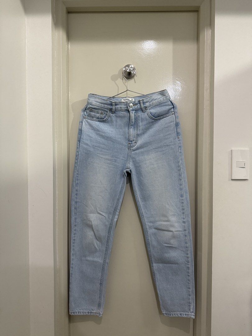 Pull & Bear Light Wash High Waisted Mom Jeans (Category: Jeans) located in Pasig City. Submitted by rchsh (Listing ID 1463851137, Image 1). Description: - Brand: Pull & Bear - Wash: Light Wash - Fit: High-waisted, Mom Jeans - Features: Classic five-pocket styling - Origin: Made in Cambodia - Size: EUR 36 / US 4 / MEX 26 - Ideal for: Everyday wear - Only used twice. No issues. Bought for Php 1,695.