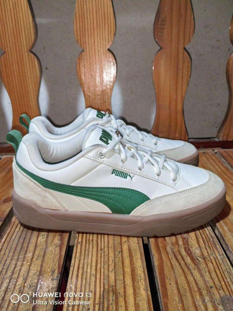 Puma White Green Suede Sneakers (Category: Casual Shoes) located in Cebu City. Submitted by abellarces30419 (Listing ID 1463800387, Image 1). Description: - Classic white Puma sneakers with stylish green accents. - Premium suede detailing on the toe and heel for a touch of texture. - Durable gum sole with a unique wavy pattern that says 'See You At The Park'. - Secure lace-up closure for a comfortable fit. - Iconic Puma logo prominently displayed