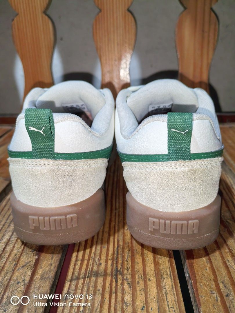 Puma White Green Suede Sneakers (Category: Casual Shoes) located in Cebu City. Submitted by abellarces30419 (Listing ID 1463800387, Image 3). Description: - Classic white Puma sneakers with stylish green accents. - Premium suede detailing on the toe and heel for a touch of texture. - Durable gum sole with a unique wavy pattern that says 'See You At The Park'. - Secure lace-up closure for a comfortable fit. - Iconic Puma logo prominently displayed
