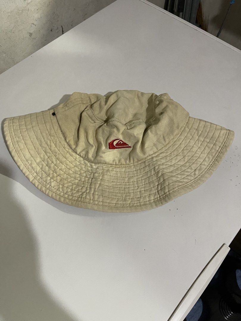Quiksilver Bucket Hat Tan (Category: Caps & Hats) located in Mandaluyong City. Submitted by mark2pac (Listing ID 1463884947, Image 1). Description: - Quiksilver bucket hat - Tan color - Classic design - Ideal for sunny days and casual wear - Shows some signs of wear, but plenty of life left.