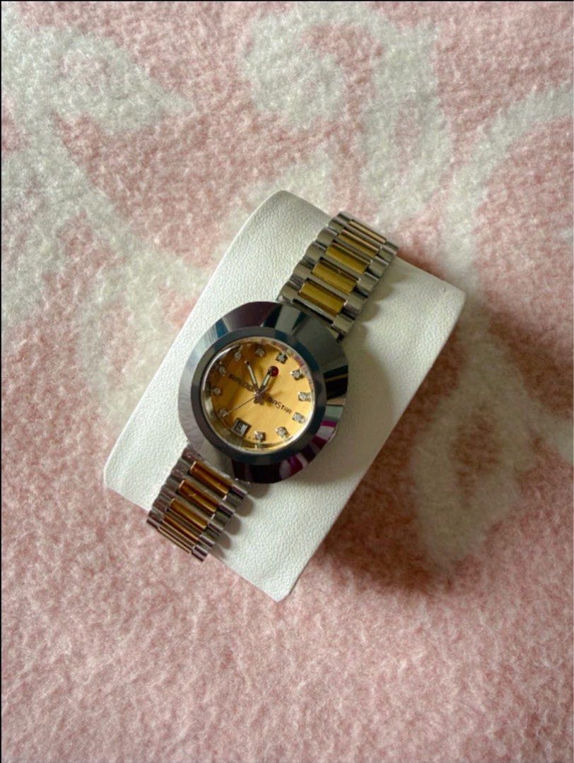 Rado (Category: Women's Watches) located in Manila. Submitted by annafinds (Listing ID 1463922726, Image 3). Description: A Rad0 D!astar Original automatic watch showcasing a striking oval hardmetal bezel, a gold-tone dial with diamond hour markers, and a two-tone stainless steel and yellow-gold bracelet. - In excellent condition -Ladies size ( Small) - For small to medium wrist only ₱39,500 Open for layaway. Disclaimer: We are not affiliated, as