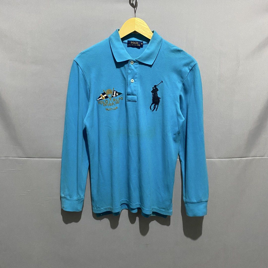 Ralph Lauren (Category: Coats, Jackets and Outerwear) located in Baguio. Submitted by loc_bc (Listing ID 1463900948, Image 1). Description: turquoise long-sleeve Polo Ralph Lauren polo shirt featuring a distinctive black Big Pony logo and an embroidered 1987 crest on the chest.
