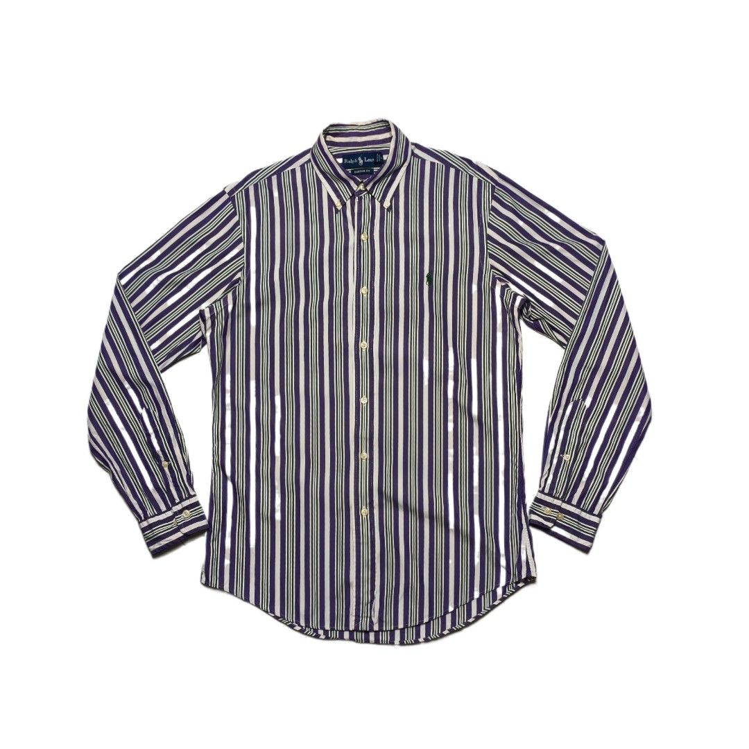 Ralph Lauren Custom Fit Striped Button-Down Shirt (Category: Tshirts & Polo Shirts ) located in Meycauayan. Submitted by thrifting_gorilla (Listing ID 1463930982, Image 1). Description: - Classic Ralph Lauren button-down shirt -Dimes: 20.5 x 30-31 - Sleeves: 26 - Features purple, green, and white vertical stripes - Signature embroidered pony logo on the chest - Button-down collar and button cuffs - Perfect for casual or smart-casual occasions - M