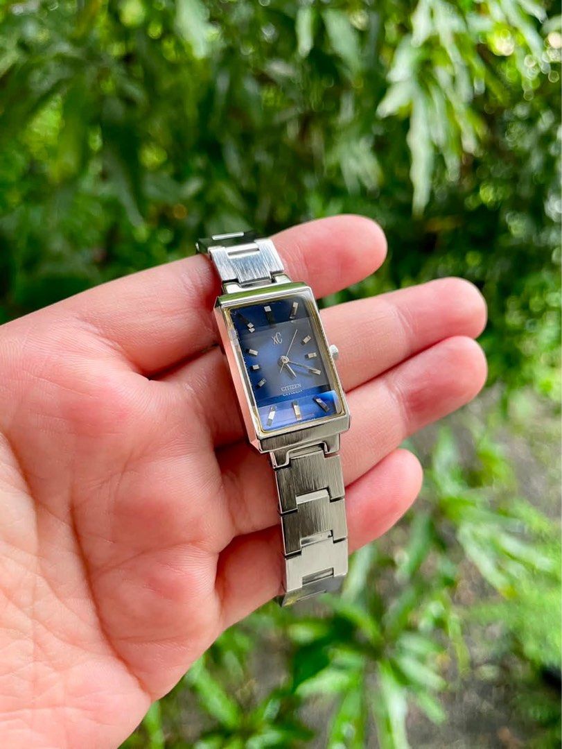 RARE Citizen XC Blue Dial Quartz Watch (Category: Women's Watches) located in Makati City. Submitted by mujiyah (Listing ID 1463816525, Image 3). Description: - Citizen watch - Rectangular blue dial - Silver metal strap - Simple and classic design - Includes classic box - Ideal for everyday or special occasions Reference No.: 5930-H07855 Japan Quartz Movement SN: 780046 Water Resistant Stainless Resistant Dimensions: 19.5mm including crown.