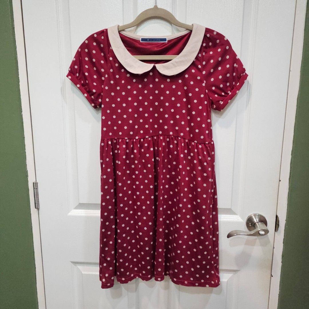 Red Polka Dot Dress with Peter Pan Collar (Category: Dresses) located in Makati City. Submitted by goldenbird.001 (Listing ID 1463890595, Image 1). Description: - Adorable red dress with classic white polka dots. - Features a charming Peter Pan collar and short sleeves. - Cinched waist with a flattering gathered skirt. - Made from comfortable fabric for all-day wear. - Ideal for casual outings or fun events..