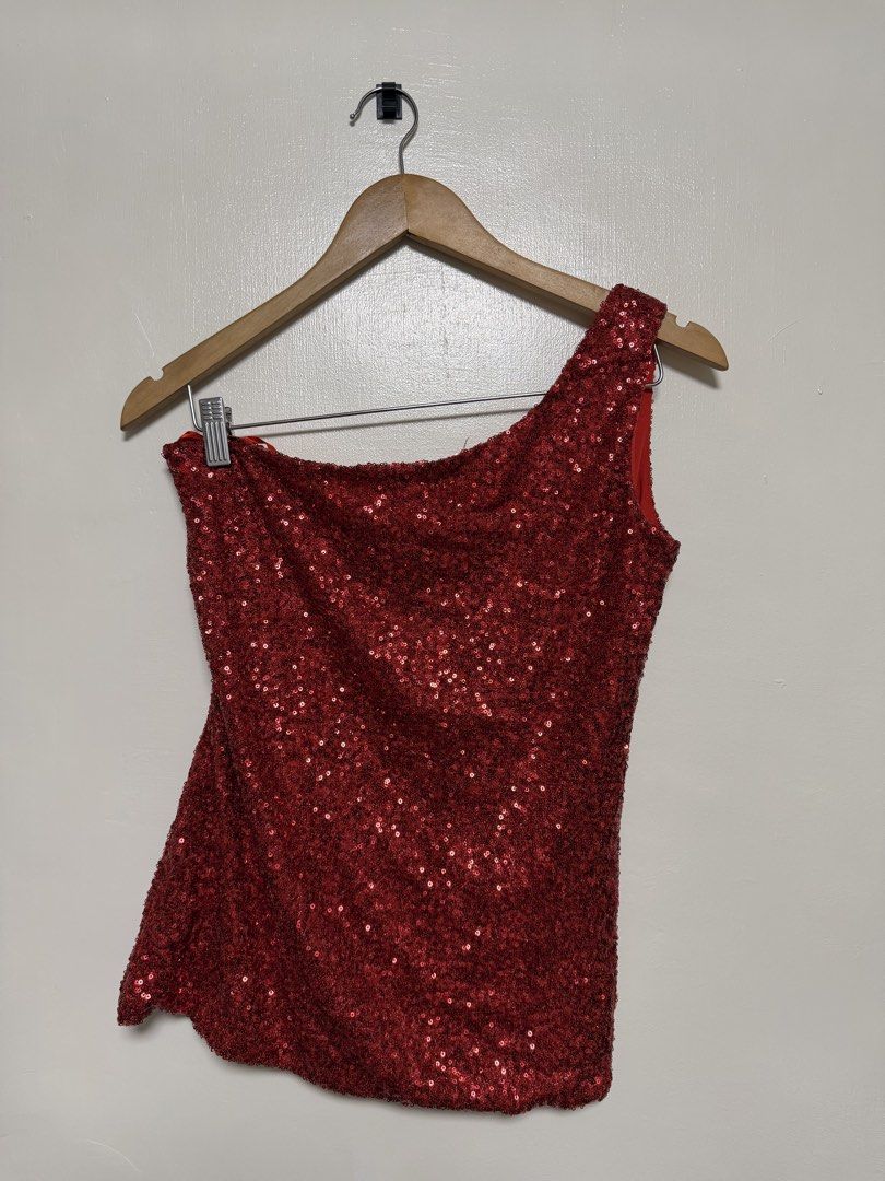 Red Sequin One Shoulder Top (Category: Sleeveless) located in Manila. Submitted by don_p (Listing ID 1463867855, Image 1). Description: S to M - Sparkly red fabric - Chic one-shoulder design - Sleeveless style - Ideal for parties, nights out, or any occasion needing a touch of glam - Catches the light beautifully - Comfortable for all-night wear.