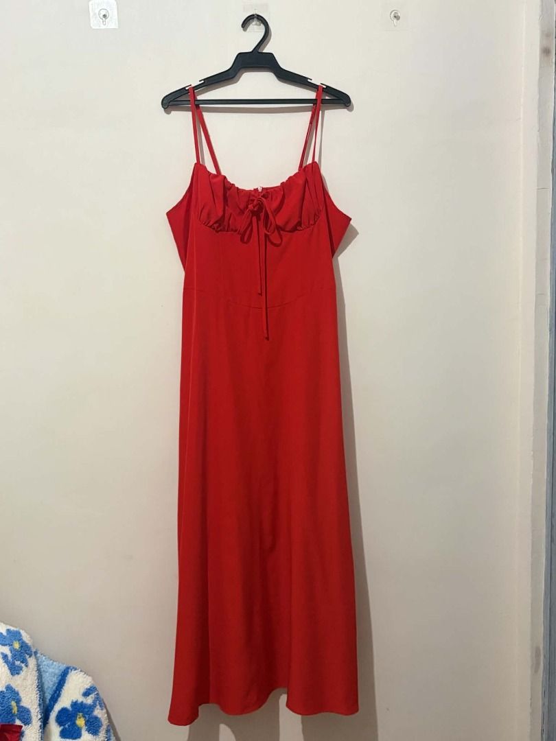 Red Spaghetti Strap Midi Dress with Tie Front (Category: Dresses) located in San Leonardo. Submitted by burgossanleonardo.12345 (Listing ID 1463915280, Image 1). Description: - Red midi dress - Spaghetti straps - Tie-front detail at the bust - Flowy fabric - Versatile for casual or night out - Simple and chic design.