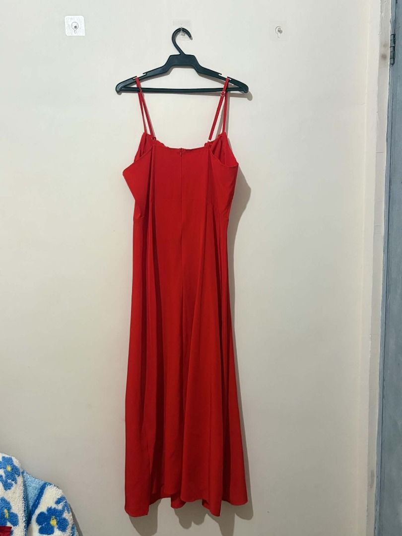Red Spaghetti Strap Midi Dress with Tie Front (Category: Dresses) located in San Leonardo. Submitted by burgossanleonardo.12345 (Listing ID 1463915280, Image 2). Description: - Red midi dress - Spaghetti straps - Tie-front detail at the bust - Flowy fabric - Versatile for casual or night out - Simple and chic design.