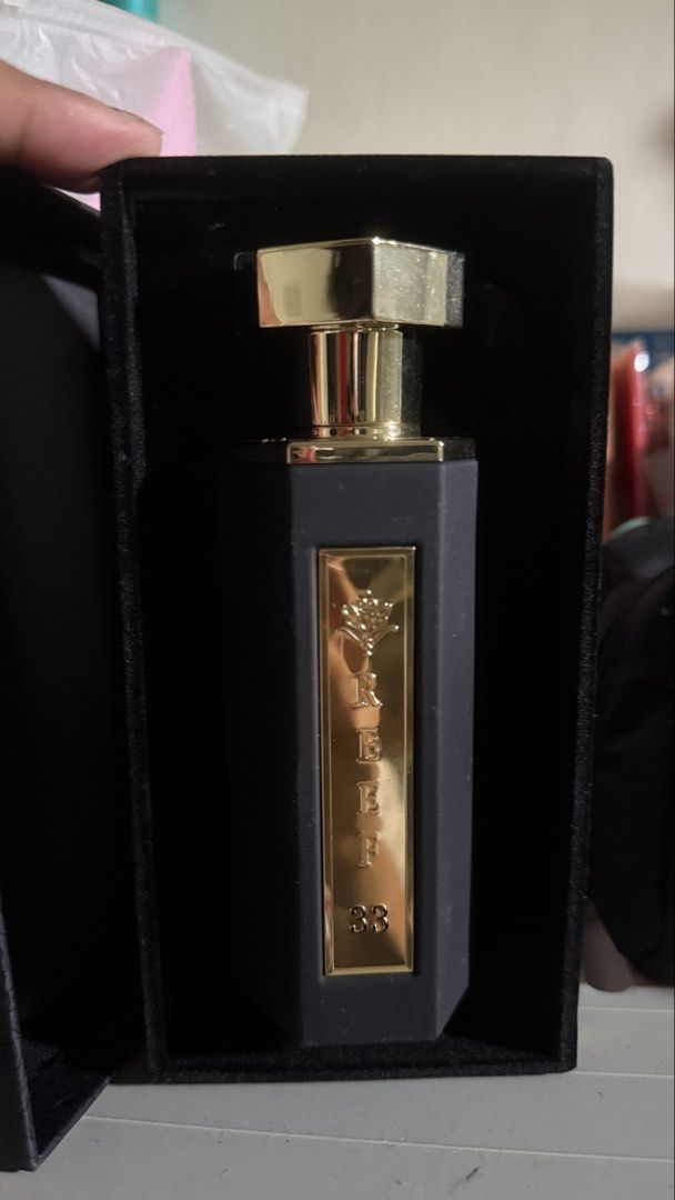 Reef 33 Perfume for Men (Category: Fragrance & Deodorants) located in Mandaluyong City. Submitted by arlorebecc47663 (Listing ID 1463794856, Image 2). Description: - Reef 33 Perfume - Sleek black bottle with gold accents - Elegant black packaging with rose pattern - Wonderful, captivating scent - Selling because of an overabundance of perfumes - Feel free to ask any questions! - Never Used and Sprayed.