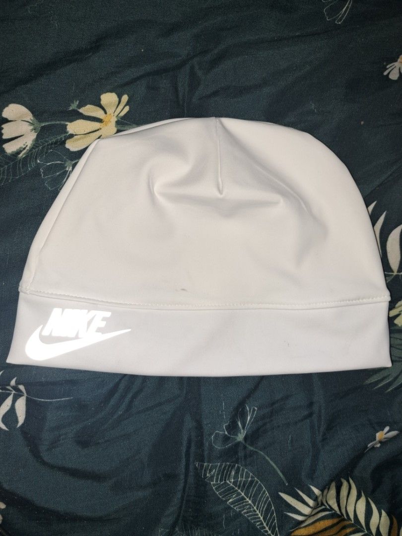 Reflectorize Skull Cap (Category: Caps & Hats) located in Manila. Submitted by sainty.exe (Listing ID 1463814066, Image 1). Description: - White Nike beanie - Features a reflective Nike logo on the front - Keeps you warm and cozy - Simple, clean design - Ideal for everyday wear .