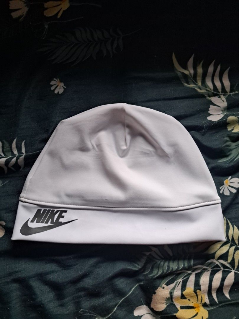 Reflectorize Skull Cap (Category: Caps & Hats) located in Manila. Submitted by sainty.exe (Listing ID 1463814066, Image 2). Description: - White Nike beanie - Features a reflective Nike logo on the front - Keeps you warm and cozy - Simple, clean design - Ideal for everyday wear .