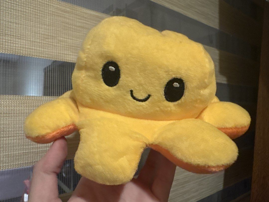Reversible Octopus Plush Toy - Happy & Sad (Category: Plushies & Soft Toys) located in Manila. Submitted by tsukkisell (Listing ID 1463930052, Image 1). Description: - Super cute reversible octopus plushie - Flip it inside out to change mood - Happy yellow side - Grumpy orange side - Soft and cuddly material - Perfect for kids - Great as a fun desk decoration - Easy to switch between faces.