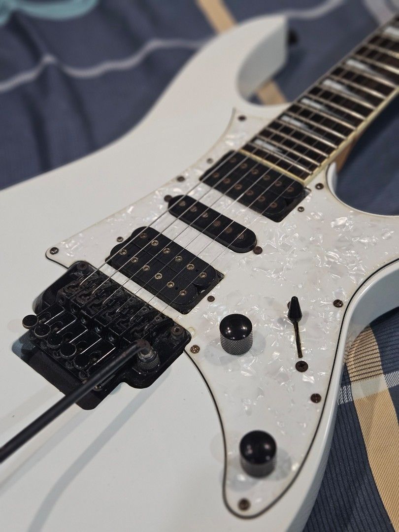 RG450DXB (Category: Musical Instruments) located in San Pedro. Submitted by tamtamsss (Listing ID 1463813509, Image 3). Description: Ibanez RG450DXB-WH electric guitar - Overall very good condition, plays and sounds great, and electronics are working properly. - Floyd Rose + whammy bar are functional. - One noticeable ding sa likod. - Kalawang sa screws. San Pedro, Laguna area. G lang sa meetup and pm lang if you need a demo vid. Refer nalang sa 