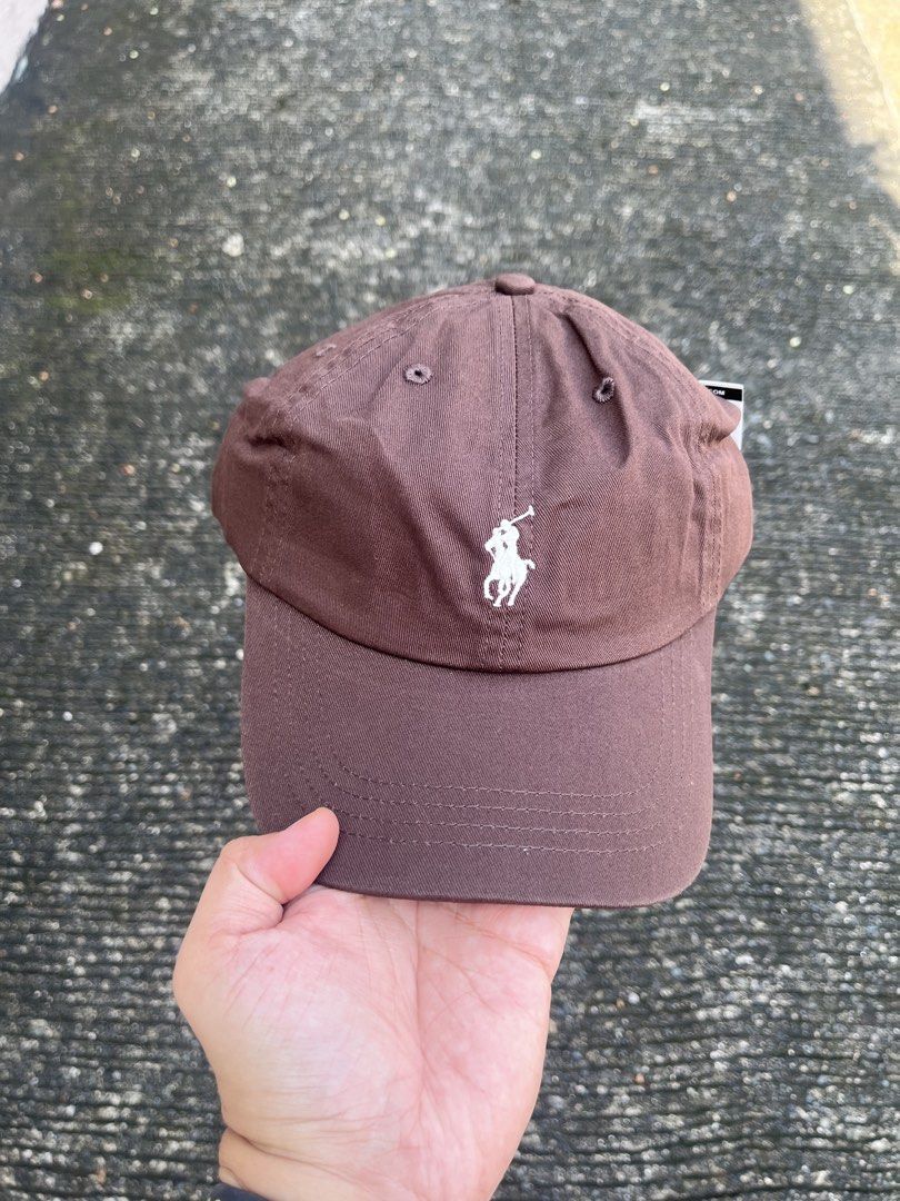RL POLO CHOCO BROWN (Category: Caps & Hats) located in Manila. Submitted by mavixcollection (Listing ID 1463766972, Image 2). Description: AVAILABLE ❗️Brand New Item : RL POLO small pony Choco Brown SALE Price❗️ : ₱999 add 100 for shipping and handling via J&T Before : ₱2,500 ❌ Size: OSFA / Adjustable Bnew - never worn Swipe for more details➡️ Color may vary due to lighting 💡 NO COD ❎ Payment : Gotyme & Gcash 💳 No refunds, No return, No exchang
