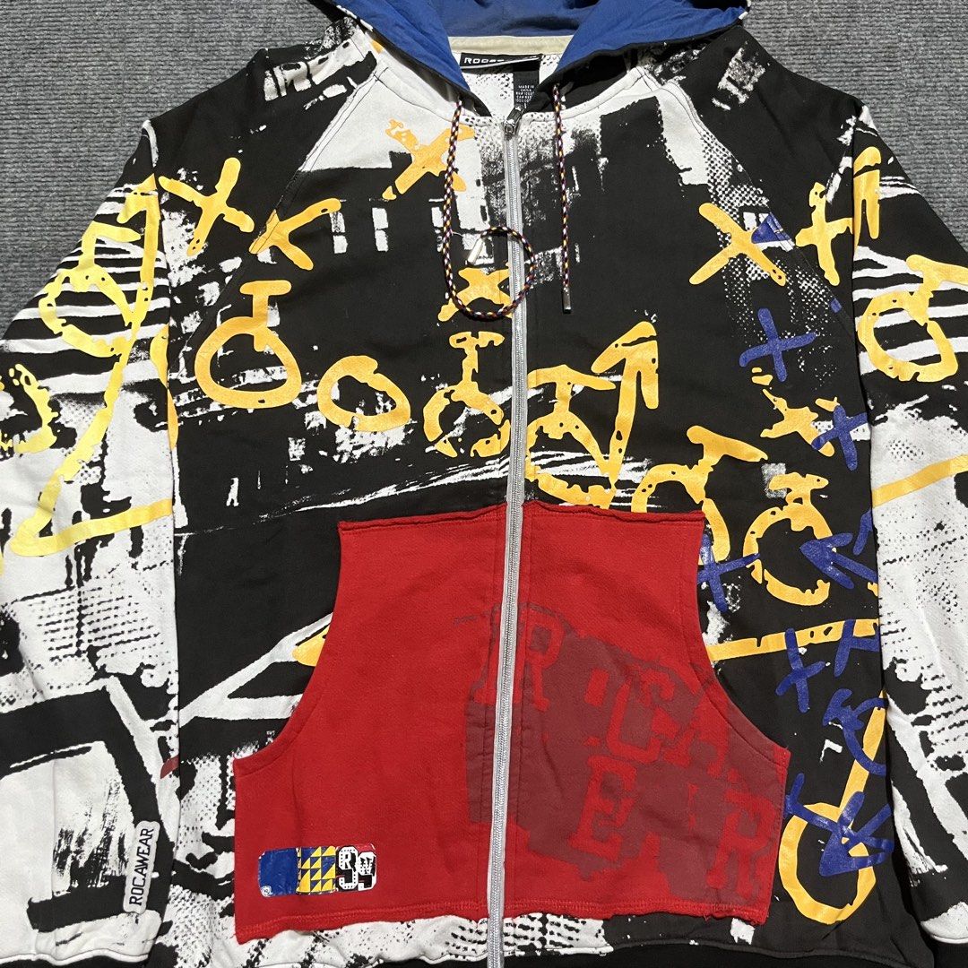 Rocawear Aop Full Zip Hoodie (Category: Coats, Jackets and Outerwear) located in Mangaldan. Submitted by gripsumloots (Listing ID 1463810548, Image 2). Description: Rocawear Aop Hoodie Large on tag Length: 30.5” Width: 25.5” Issue: unnoticeable stain inside hood.