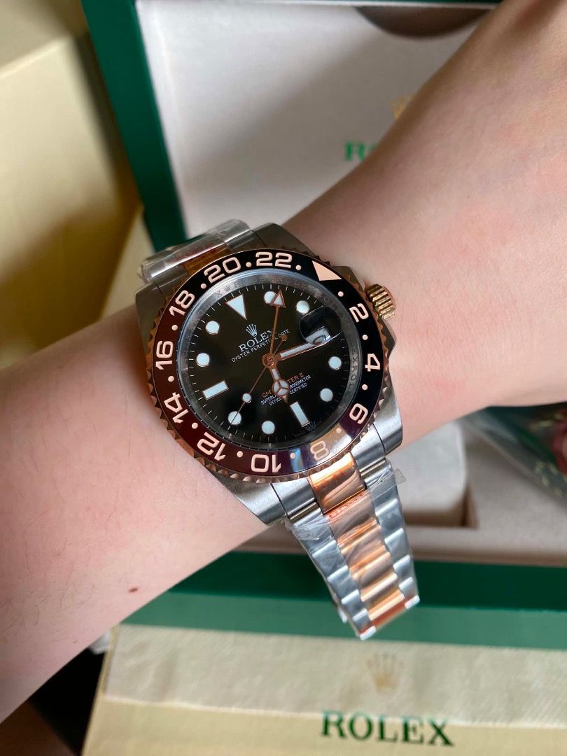 ROLEX ROOT BEER (Category: Luxury Watches) located in Caloocan City. Submitted by mrbigdreams (Listing ID 1463765676, Image 2). Description: - Rolex GMT-Master II - Two-tone steel and rose gold construction - Classic black dial with date function - Rotating bezel for tracking multiple time zones - Comfortable and durable Oyster bracelet - Ideal for travelers and everyday wear - Comes with original box.
