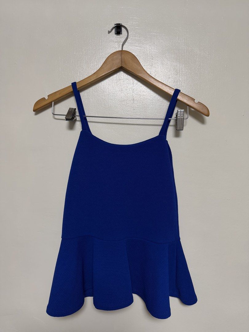Royal Blue Peplum Top with Spaghetti Straps (Category: Sleeveless) located in Manila. Submitted by don_p (Listing ID 1463861382, Image 1). Description: XS to S Cute royal blue peplum top. It has spaghetti straps and a textured fabric. The peplum hem flares out nicely. Great for dressing up or down. Easy to pair with jeans or a skirt. Looks good on its own or layered..
