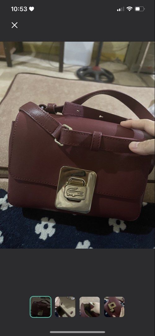 SALE Lacoste Bag Maroon (Category: Luxury Bags & Wallets) located in Quezon City. Submitted by rish40 (Listing ID 1463767277, Image 3). Description: - used once! sayang bagong bago pa walang gumagamit - Genuine maroon leather shoulder bag by Lacoste - Features a gold-tone buckle closure with iconic crocodile logo - Spacious beige interior - Adjustable strap for comfortable wear - Ideal for everyday style and practicality.