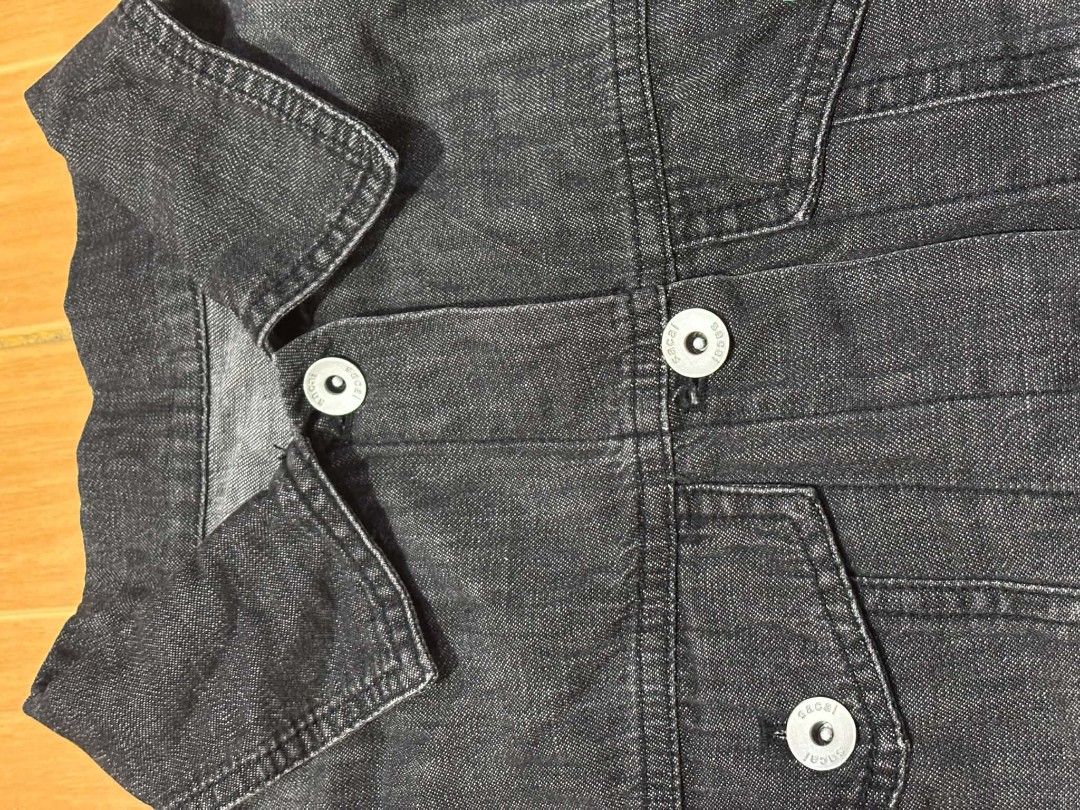 Sacai Denim Jacket with Printed Pleated Back (Category: Coats, Jackets and Outerwear) located in Paranaque City. Submitted by poego (Listing ID 1463853078, Image 2). Description: - Cool Sacai denim jacket - Dark wash denim front with button closure - Unique pleated back with black and white map print - Short sleeves - Perfect for layering or standalone wear - Made in Japan.