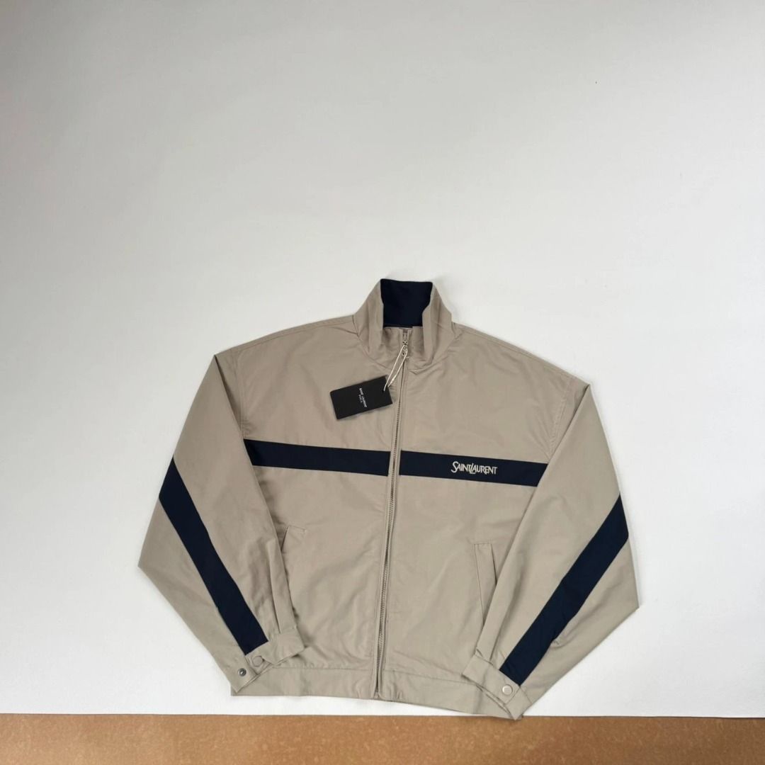 Saint Laurent Cotton Jacket in Beige/Blue (Category: Coats, Jackets and Outerwear) located in Manila. Submitted by mountebanc_on_ig (Listing ID 1463852052, Image 2). Description: Saint Laurent Cotton Jacket in Beige/Blue Stand-collar jacket crafted from a structured blend with a viscose and cotton lining. Features a Cassandre front zip closure, drop shoulders, two welt pockets, a stand collar, single snap-button cuffs, and subtle embroidery at th