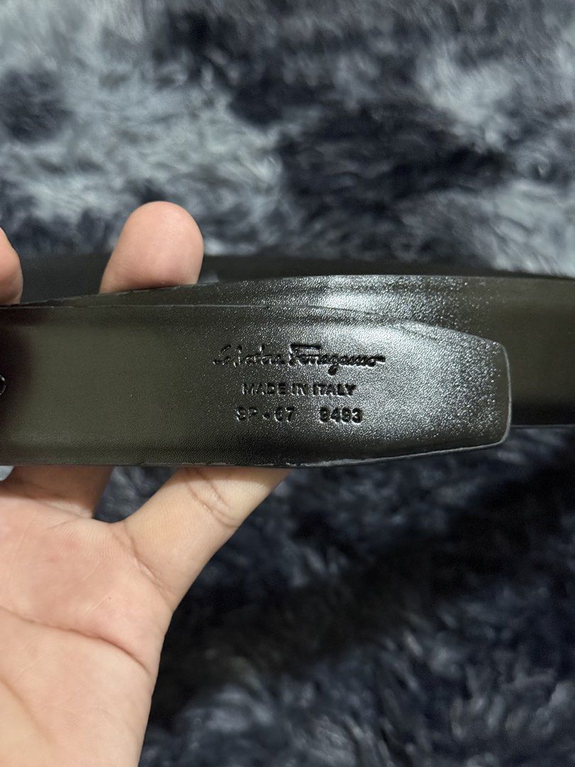 Salvatore Ferragamo Gancini Belt (Category: Belts) located in Manila. Submitted by adriyawnnn (Listing ID 1463928080, Image 2). Description: - Authentic Salvatore Ferragamo belt - Color: Black leather - Iconic Gancini buckle with matte black finish - Made in Italy - Sold as is.