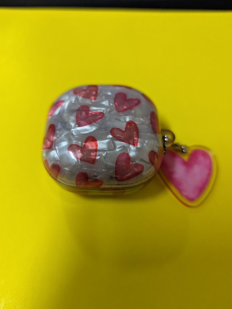 Samsung Galaxy Buds 2 Pro with Cases (Category: Earphones) located in Vigan. Submitted by kortnidru (Listing ID 1463753488, Image 3). Description: - Samsung Galaxy Buds 2 Pro (Black) - Comes with a cute heart case, will also include a purple silicone one - With box and extra replacement tips - No issue RFS: not using Samsung phone as my main.