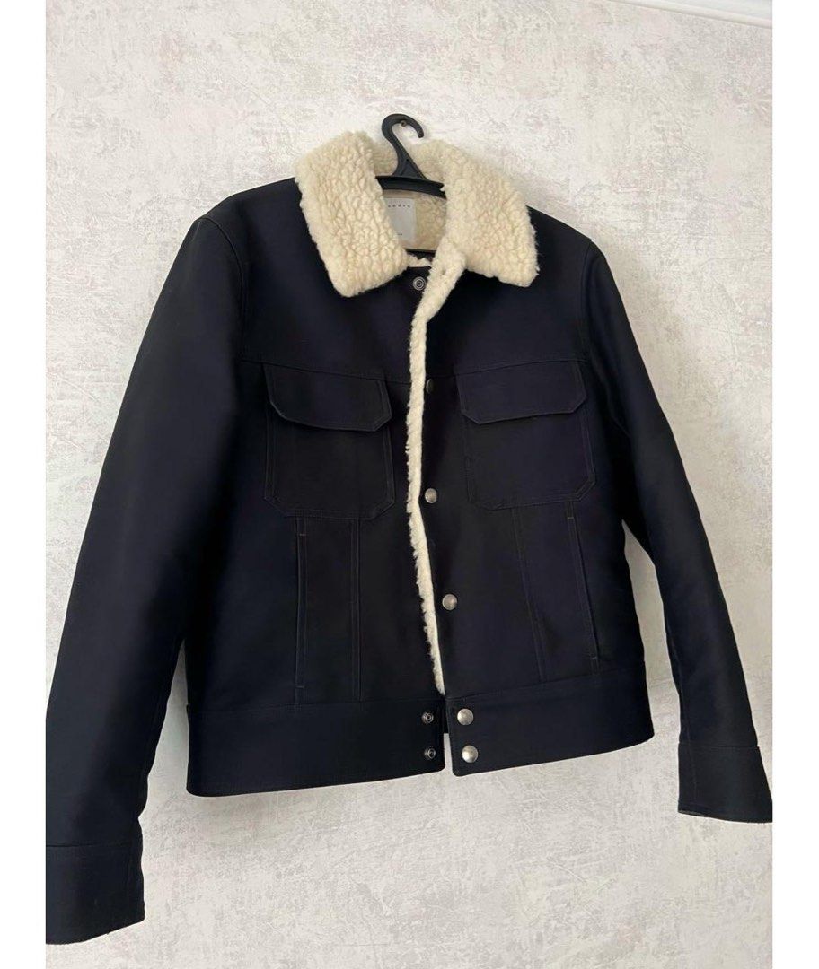 Sandro Paris Mens Shearling Aviator Jacket (Category: Luxury Apparel) located in Makati City. Submitted by quickbuysx (Listing ID 1461433470, Image 1). Description: Navy & Cream Sherpa Lined Jacket Excellent condition. No discoloration and well maintained. Shoulder 17” Chest 20” Length 26” Sleeve Length 24.5”.
