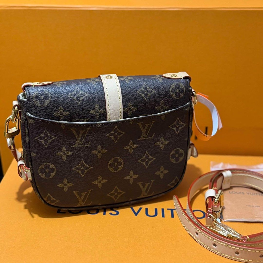 Sale‼️Saumur BB Monogram Shoulder Bag (Category: Luxury Bags & Wallets) located in Manila. Submitted by bagsandshoesmanymore (Listing ID 1463752763, Image 2). Description: Lv Saumur BB Size 20cm(L) x 16cm(H) x 7.5cm(W) Monogram coated canvas Natural cowhide trim Gold-color hardware Before 16,500 Microber lining 2 side buckles Bqck flat pocket Strap:Removable, Adjustable Handle:Single, removable Made in France Microchip scannable serial.