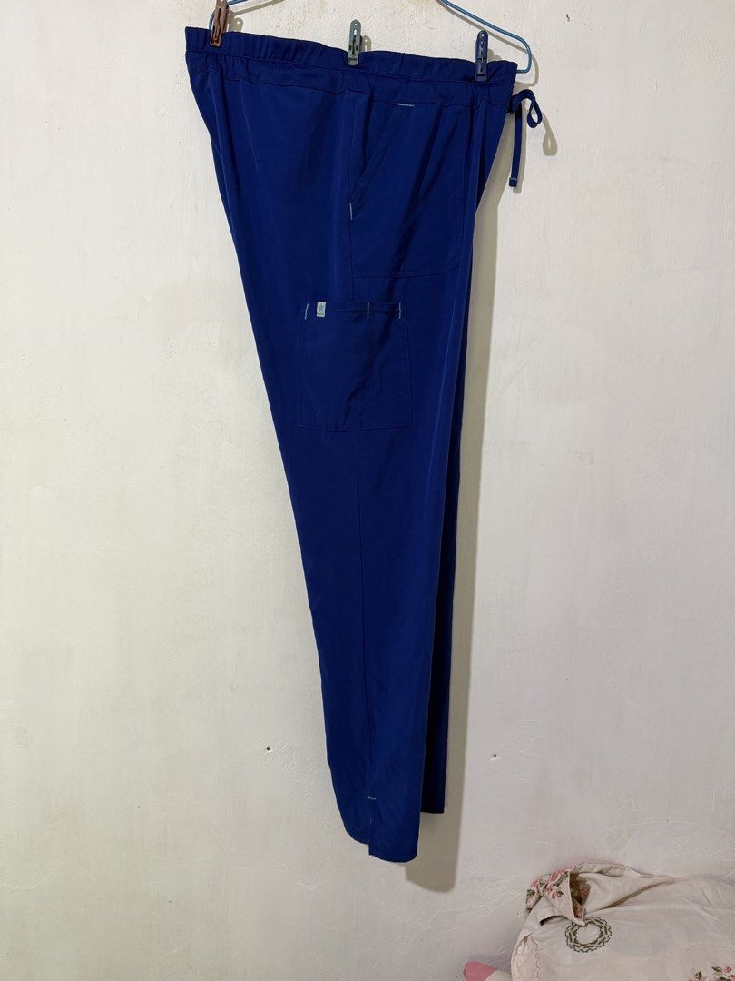 Scrubstar Royal Blue Cargo Scrub Pants (Category: Joggers) located in Tuguegarao City. Submitted by janurtist (Listing ID 1463744007, Image 2). Description: - Royal blue cargo scrub pants by Scrubstar - Elastic waistband with adjustable drawstring - Multiple pockets for ample storage - Side slits at the hem for ease of movement - Comfortable and practical for everyday wear Selling for 500 SF not included Loc: Abulug, Cagayan Can ship via J&T.