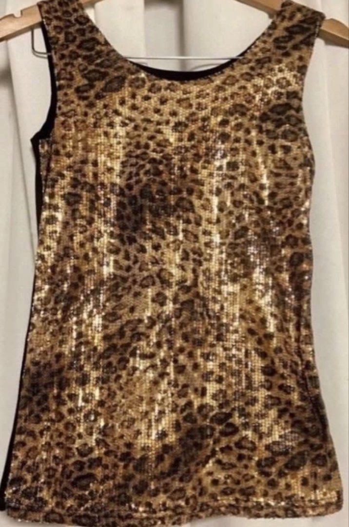 Sequin Leopard Print Tank Top (Category: Sleeveless) located in Caloocan City. Submitted by declutteringph. (Listing ID 1463868571, Image 2). Description: No Size on the tag! Measurements: Dimensions: (inches) Bust Width: 16” Body Length: 24” .