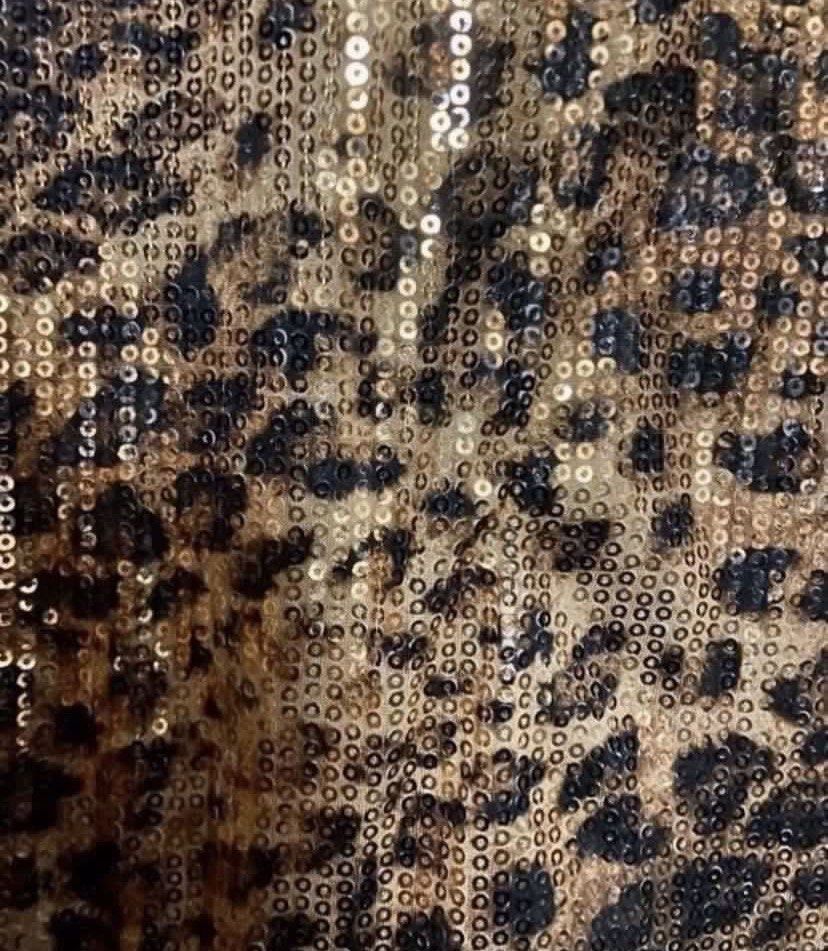 Sequin Leopard Print Tank Top (Category: Sleeveless) located in Caloocan City. Submitted by declutteringph. (Listing ID 1463868571, Image 3). Description: No Size on the tag! Measurements: Dimensions: (inches) Bust Width: 16” Body Length: 24” .