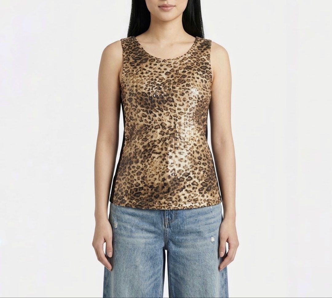 Sequin Leopard Print Tank Top (Category: Sleeveless) located in Caloocan City. Submitted by declutteringph. (Listing ID 1463868571, Image 1). Description: No Size on the tag! Measurements: Dimensions: (inches) Bust Width: 16” Body Length: 24” .