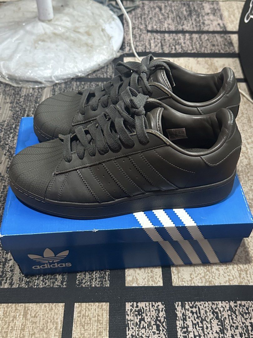 Shadow Olive Adidas Superstar XLG (Category: Sneakers) located in Cebu City. Submitted by ajorsomethingidk (Listing ID 1459448363, Image 3). Description: - Classic Adidas Superstar XLG - Bought in SM Seaside footlocker way back in 2024 - Barely used - Shadow Olive colorway (color may vary due to lighting, check 6th pic for actual color. I can provide more photos) - No major issues - Genuine leather upper - Iconic three stripes detail - Signature 