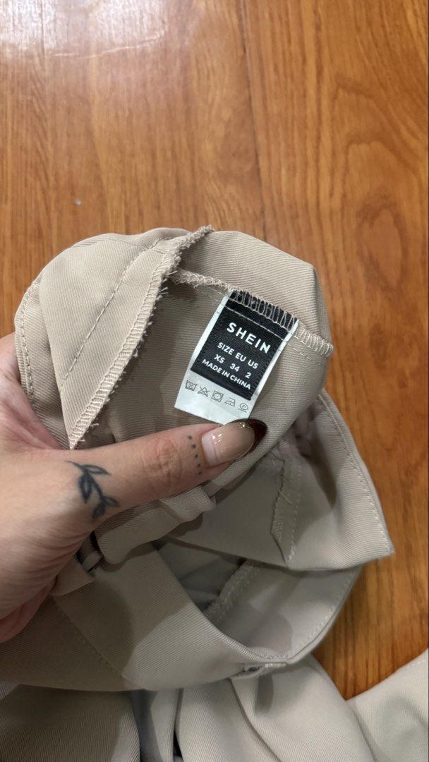 SHEIN Beige Wide Leg Culottes Pants (Category: Jeans) located in Antipolo. Submitted by japanese.siomai (Listing ID 1463796234, Image 2). Description: - SHEIN beige culottes - Wide leg style with front pleats - High-waisted fit - Size XS - Versatile for casual or work outfits - Comfortable and stylish.