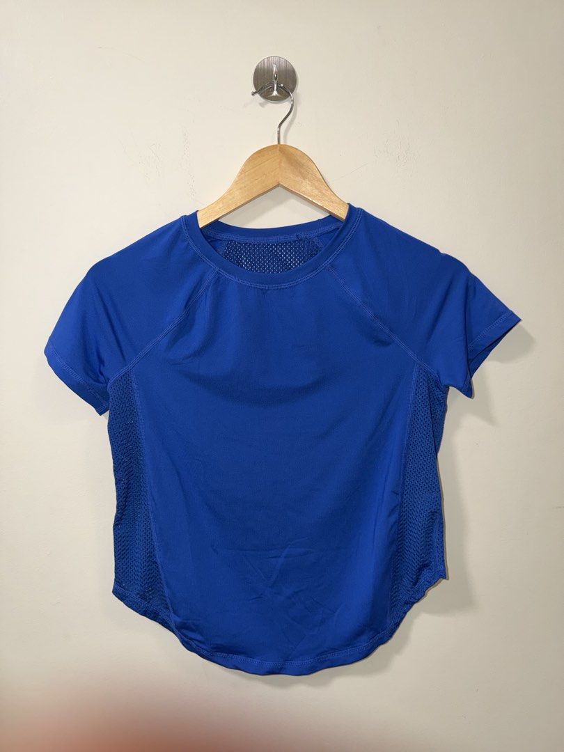 SHEIN Blue Mesh Panel Athletic T-Shirt Size S (Category: Shirts) located in Makati City. Submitted by andzr. (Listing ID 1463885019, Image 1). Description: - Blue athletic t-shirt from SHEIN - Short sleeves with mesh panels on sides and back for breathability - Curved hemline - Ideal for workouts or casual wear - Made in China.