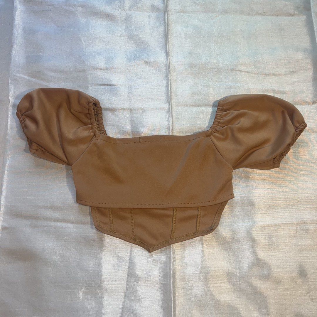 SHEIN Brown Puff Sleeve Corset Top (Category: Blouses) located in Cainta. Submitted by caffinjty (Listing ID 1463830804, Image 2). Description: - Size M on tag but can fit size small - Puff sleeves - Square neckline.