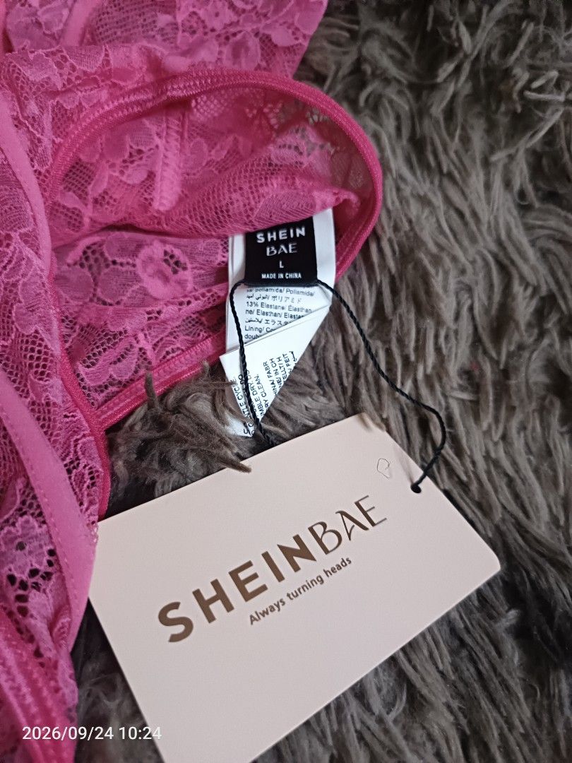 SHEINBAE Pink Lace Corset Top (Category: Sleeveless) located in Navotas City. Submitted by ladyjansen (Listing ID 1463760917, Image 3). Description: - Brand new hot pink lace corset top - Size L - Boning details for excellent shaping - Strapless design - Perfect for a night out or to add a sexy touch to any outfit - Tags still attached.