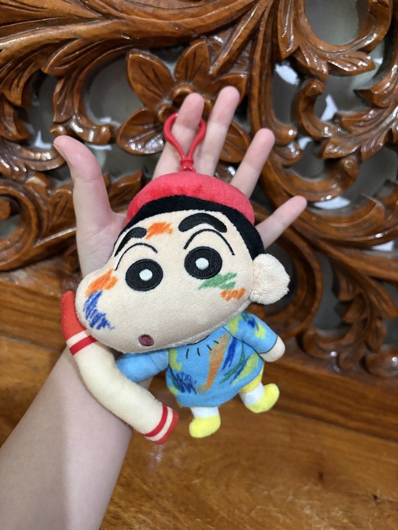Shinchan Plush Toy with Paint Splatter Design (Category: Plushies & Soft Toys) located in Quezon City. Submitted by rxyel (Listing ID 1463803059, Image 2). Description: - Adorable Shinchan plush toy - Features a fun paint splatter design on face and clothes - Includes a stylish red beret - Holding a paintbrush accessory - Comes with a convenient keychain loop - Ideal gift for Shinchan enthusiasts and collectors.