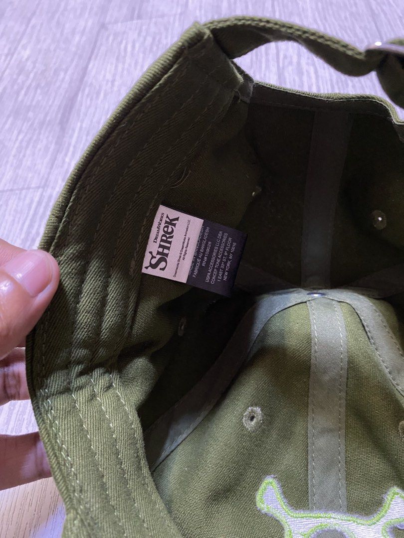Shrek 'S' Logo Baseball Cap (Category: Caps & Hats) located in Pasig City. Submitted by terrencec34805 (Listing ID 1463912287, Image 3). Description: Shrek Olive green baseball cap Bright green embroidered 'S' logo Shrek-inspired Brand new Size:One Size Fits All .