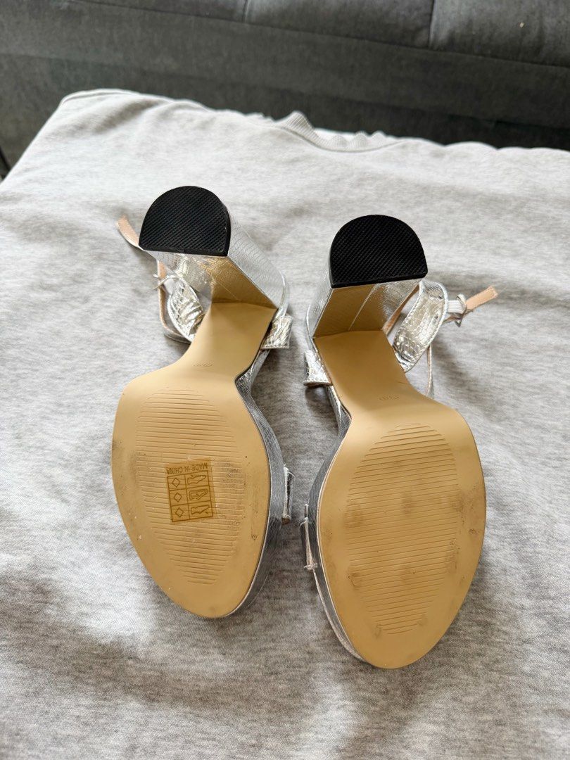 Silver Block Heel Sandals with Ankle Strap (Category: Heels) located in Manila. Submitted by closetbymia (Listing ID 1463743034, Image 3). Description: For Sale 👟✨ Size: US 7 / 24 cm Condition: never been used. Still new condition. Quality: Super nice quality & very comfy 🤍 Easy to style and can be paired with skirts, jeans, shorts, and many more! RFS: Decluttering — I have too many shoes 😅 Mode of Payment: GCash / BPI Shipping: Lalamove or J&