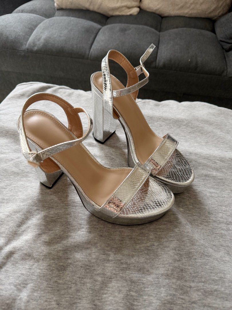 Silver Block Heel Sandals with Ankle Strap (Category: Heels) located in Manila. Submitted by closetbymia (Listing ID 1463743034, Image 1). Description: For Sale 👟✨ Size: US 7 / 24 cm Condition: never been used. Still new condition. Quality: Super nice quality & very comfy 🤍 Easy to style and can be paired with skirts, jeans, shorts, and many more! RFS: Decluttering — I have too many shoes 😅 Mode of Payment: GCash / BPI Shipping: Lalamove or J&