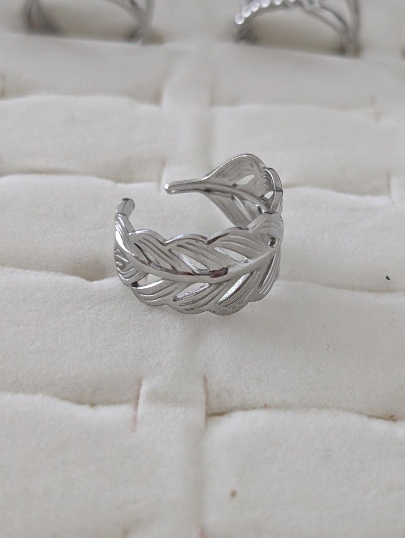 Silver Feather Leaf Adjustable Ring (Category: Rings) located in Singapore. Submitted by hana08 (Listing ID 1463841413, Image 2). Description: @$9.00 + $2.00 (postage) Stainless steel adjustable ITEM SOLD NOT EXCHANGEABLE AND NON REFUNDABLE..