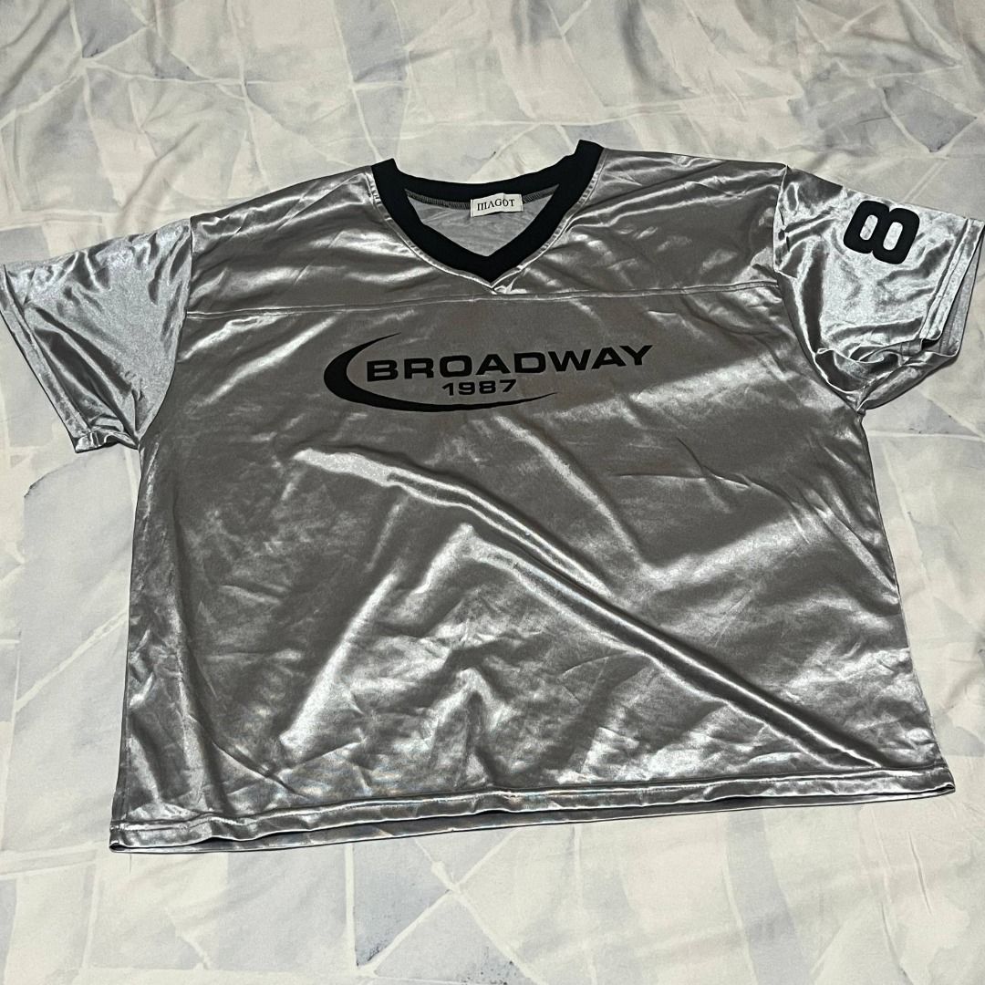 Silver Reflective Broadway Jersey Shirt (Category: Tshirts & Polo Shirts ) located in Marikina City. Submitted by preloved.mana (Listing ID 1463928088, Image 2). Description: - silver clothing, reflective when lightened - fit size large to XL - MOP: gcash, maya - MOD: lalamove, jnt, meet UST area - LOC: marikina.
