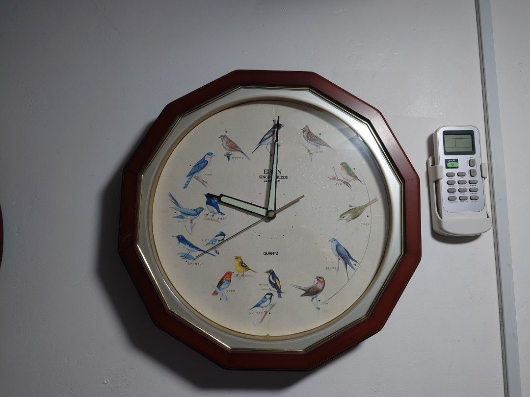 Singing Birds Clock (Category: Clocks) located in General Trias. Submitted by mervcorner (Listing ID 1463926915, Image 1). Description: Tweets every hour depending on the time and assigned bird reminding you that every hour is important. Brand: Elgin 12 Melodies Singing Birds Quartz Made in Japan Loud and Clear Sound Uses 2x Size C batteries (Included - Rechargable) and 1x AA (Included - Non Rechargable) Note: Minutero hand is malfuctioning when 