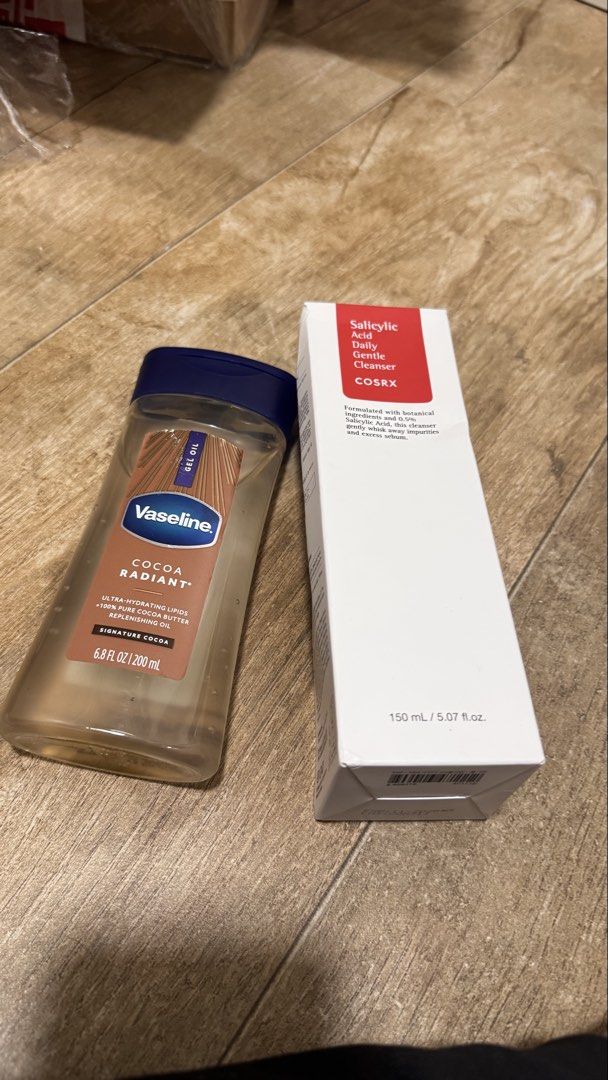 Skincare Bundle (Category: Face Care) located in Pasig City. Submitted by sdpii (Listing ID 1463854524, Image 1). Description: - Vaseline Cocoa Radiant Gel Oil (200ml): Ultra-hydrating with cocoa butter for soft, radiant skin. - COSRX Salicylic Acid Daily Gentle Cleanser (150ml): Gently removes impurities and excess sebum with botanical ingredients and salicylic acid. - Ideal for your everyday skincare regimen - Vaseline used for sometime then na