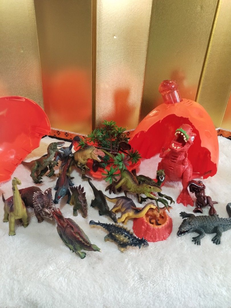 Smashers Dino Surprise Egg with Dinosaur Figures (Category: Kids Toys) located in La Trinidad. Submitted by malditas (Listing ID 1463816382, Image 3). Description: - Fun dinosaur surprise egg set - Includes 1 large red smashable egg - Comes with many small dinosaur figures inside - Some dinosaurs still in original packaging - Encourages imaginative play - Perfect for dinosaur enthusiasts - Get ready for a prehistoric adventure! From HT box BUY AS