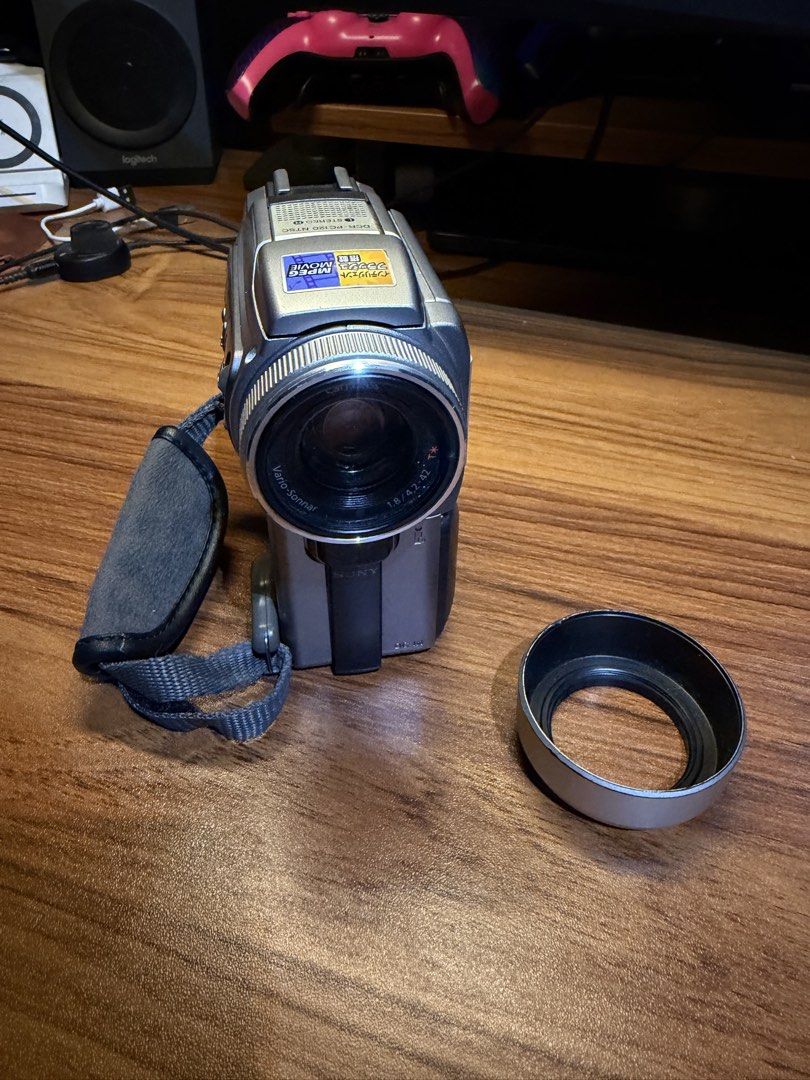 Sony DCR-PC100 Mini DV Handycam Camcorder + Tapeless Mod (Category: Cameras) located in Marikina City. Submitted by diegugee (Listing ID 1463931876, Image 2). Description: FEATURES ✅ Carl Zeiss Vario-Sonnar lens ✅ 120x optical zoom ✅ 1.5 Megapixels ✅ Video recording ✅ Fast servo zoom ✅ NightShot / Night Vision for low-light recording ✅ Bluetooth connectivity ✅ Color LCD screen ✅ Color viewfinder ✅ Memory Stick recording support ✅ Rewind, pause/st
