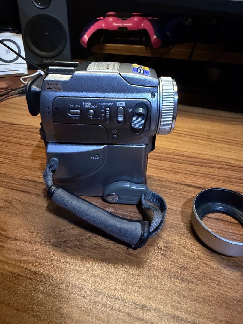 Sony DCR-PC100 Mini DV Handycam Camcorder + Tapeless Mod (Category: Cameras) located in Marikina City. Submitted by diegugee (Listing ID 1463931876, Image 3). Description: FEATURES ✅ Carl Zeiss Vario-Sonnar lens ✅ 120x optical zoom ✅ 1.5 Megapixels ✅ Video recording ✅ Fast servo zoom ✅ NightShot / Night Vision for low-light recording ✅ Bluetooth connectivity ✅ Color LCD screen ✅ Color viewfinder ✅ Memory Stick recording support ✅ Rewind, pause/st